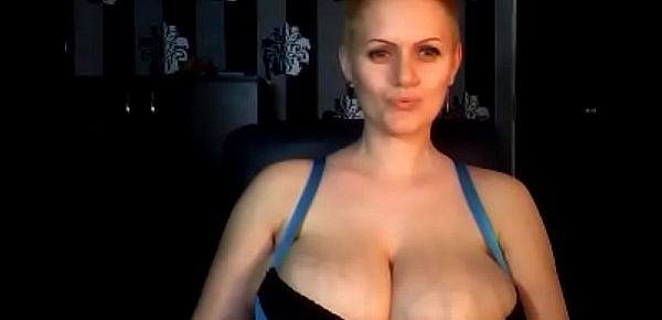 Short hair milf pushing her huge tits out and licking tease for fun